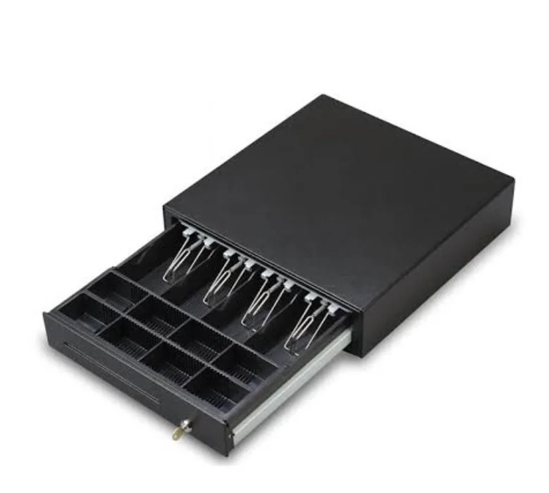 Open metal cash drawer with compartments for notes and coins